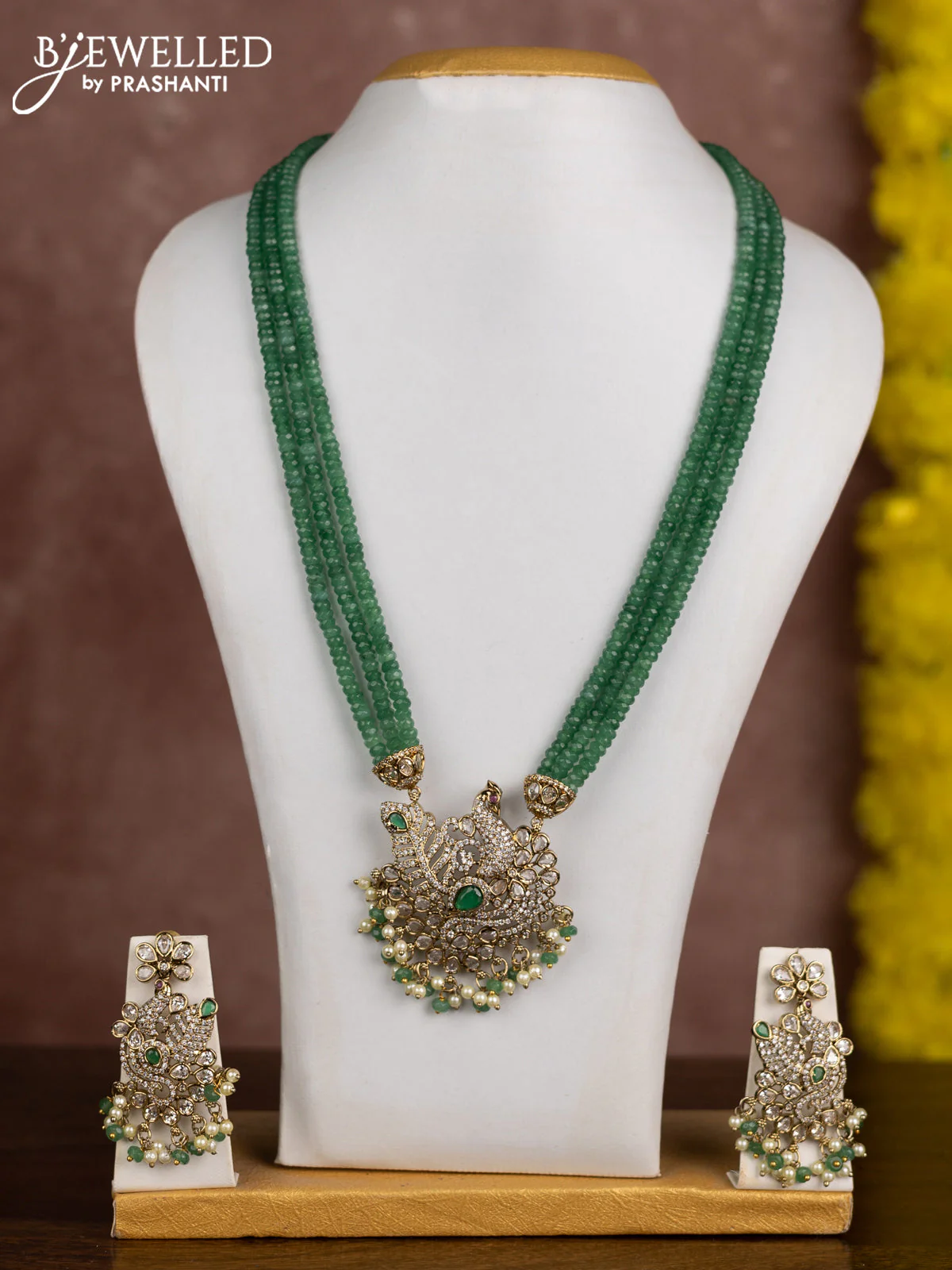 Beaded triple layer green necklace peacock design with emerald & cz stones and pearl & beads hangings in victorian finish