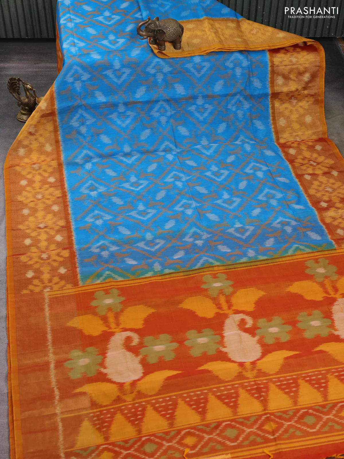 Ikat silk cotton saree blue and rustic orange with allover ikat weaves and long zari woven ikat border - Image 2