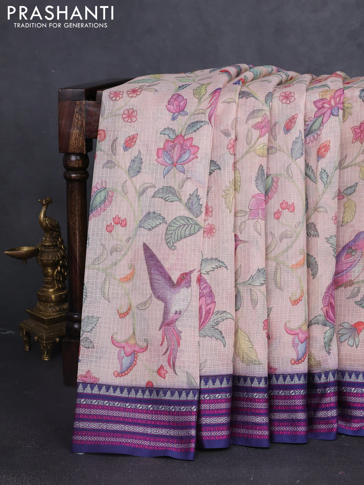 Kota silk cotton saree pastel peach and dark blue with allover digital prints and thread woven border
