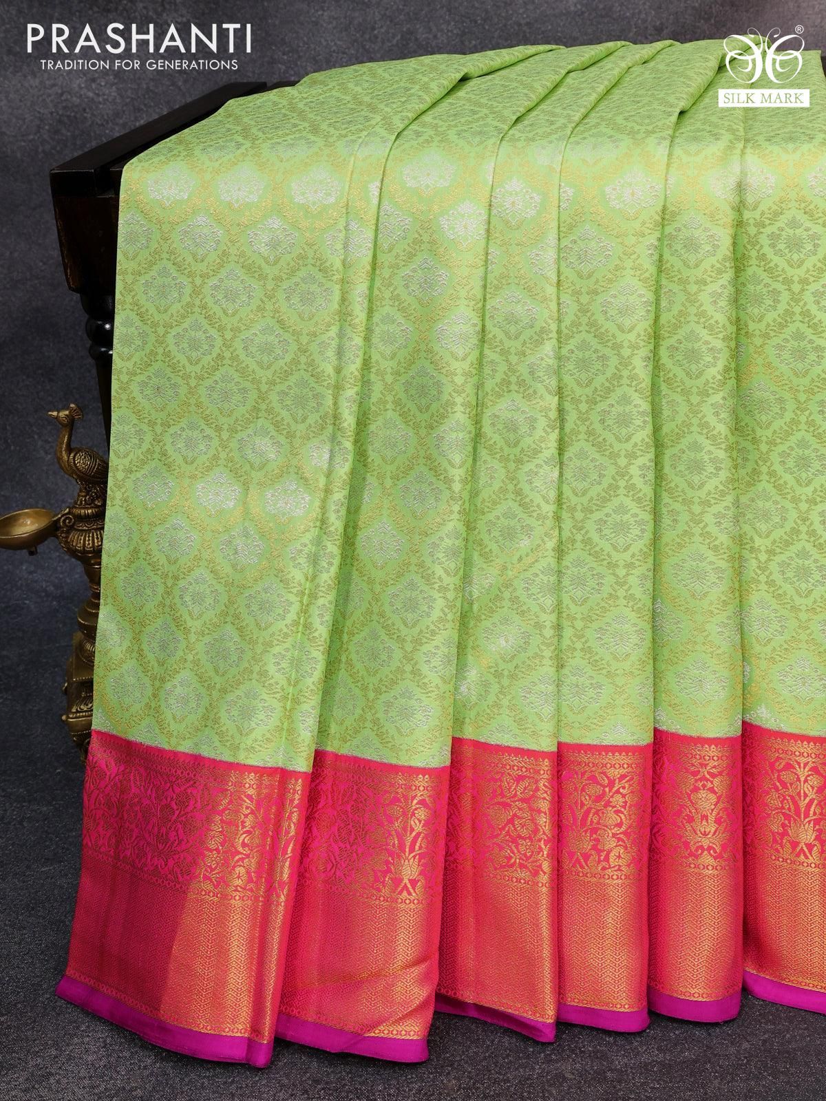 Pure kanjivaram silk saree pista green and dual shade of pinkish orange with allover silver & gold zari woven brocade weaves and floral zari woven korvai border - Image 2