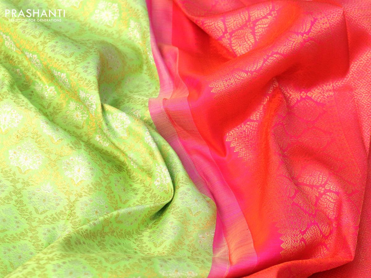 Pure kanjivaram silk saree pista green and dual shade of pinkish orange with allover silver & gold zari woven brocade weaves and floral zari woven korvai border - Image 4