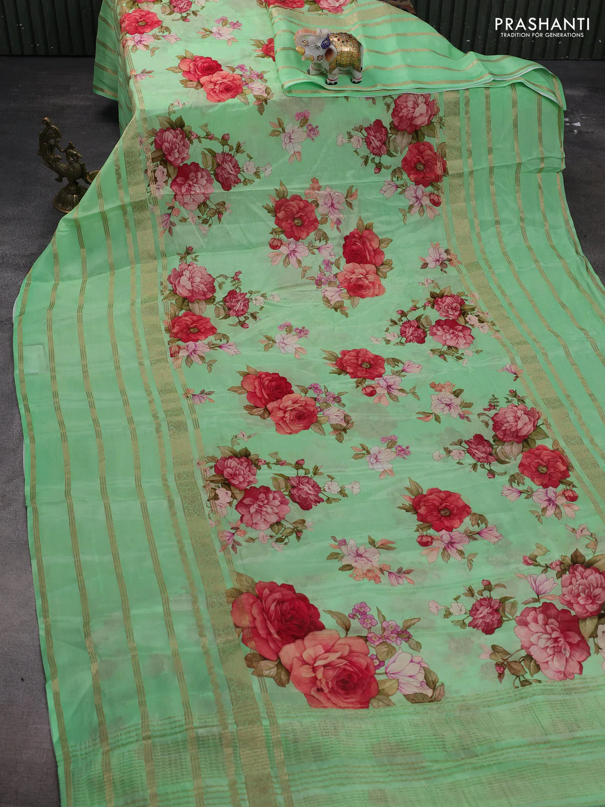 Semi georgette saree green with allover floral prints and long zari woven border - Image 2