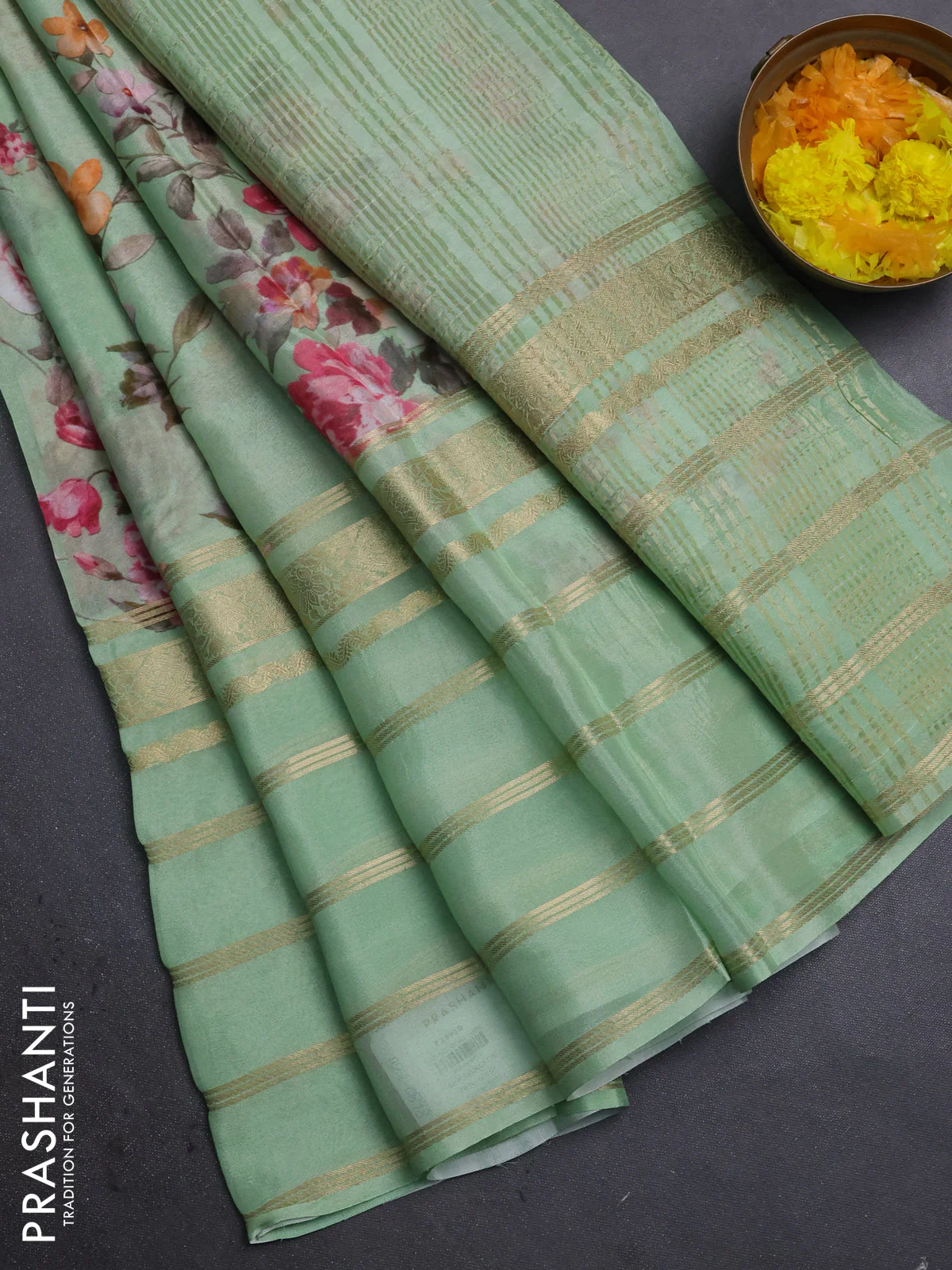 Semi georgette saree green with allover floral prints and long zari woven border
