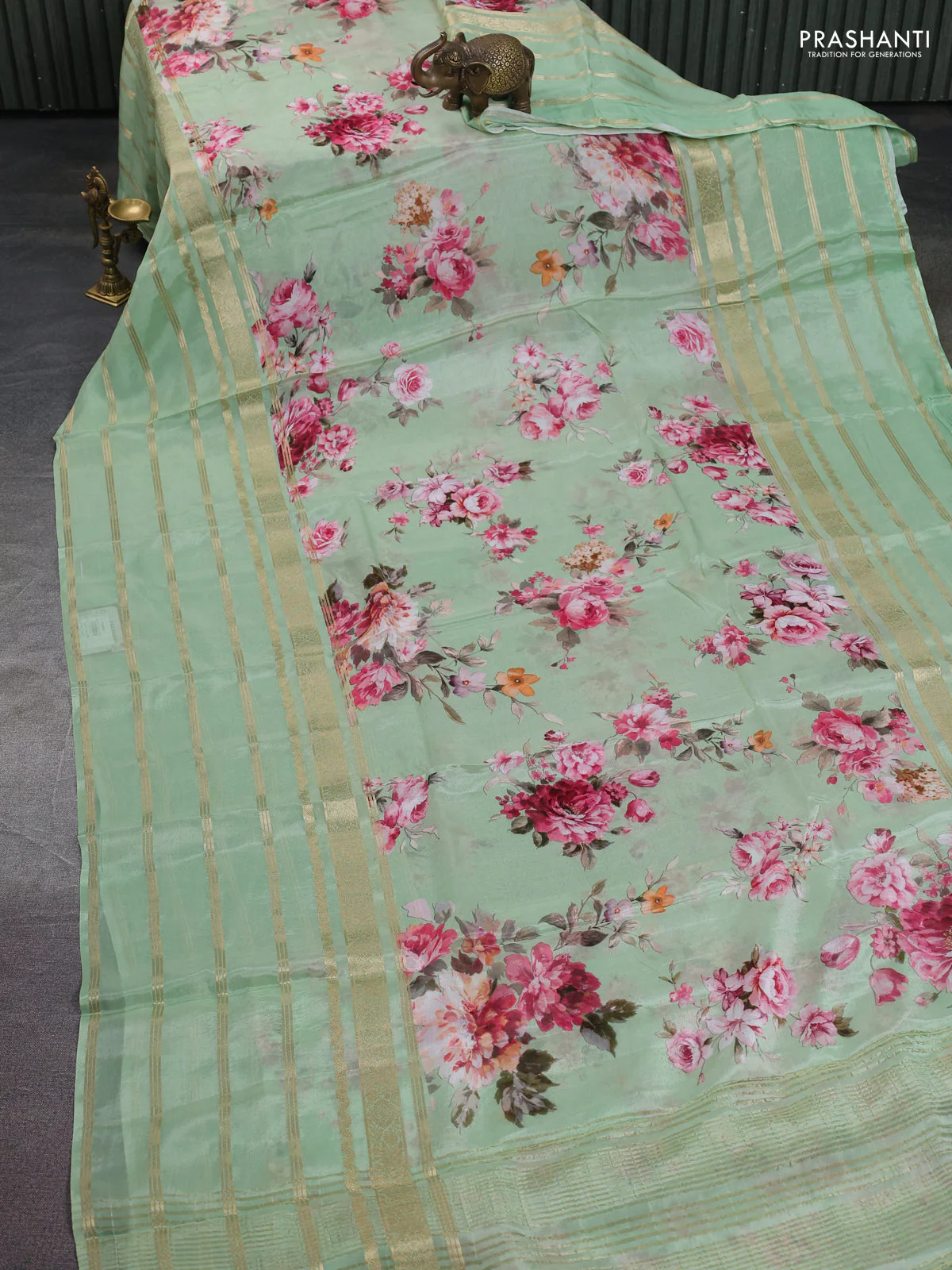 Semi georgette saree green with allover floral prints and long zari woven border - Image 2
