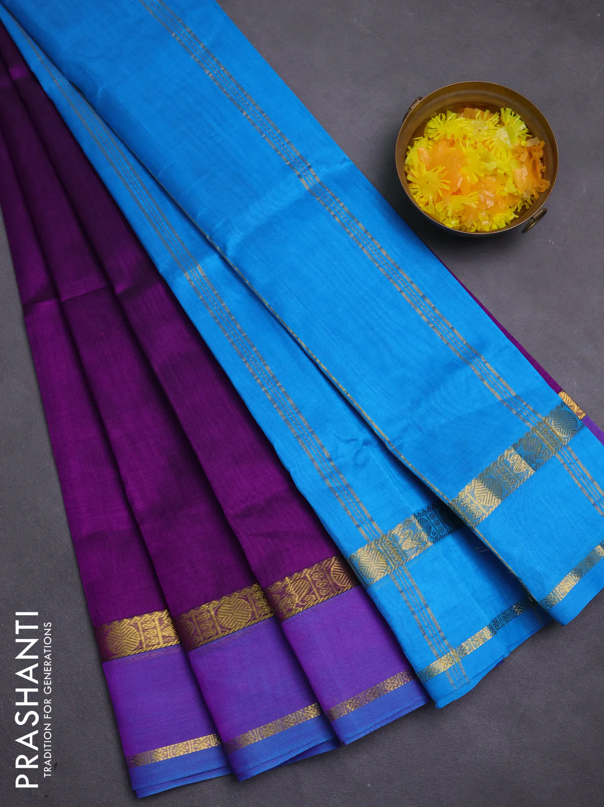 Silk cotton saree purple and cs blue with plain body and rettapet zari woven border